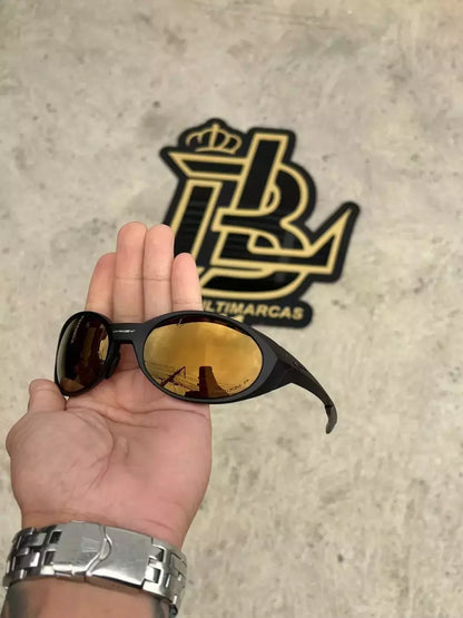 EYE JACKET PRETO LENTES GOLD CAFÉ